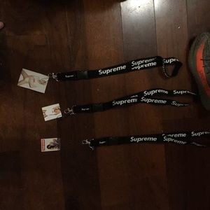 3 supreme lanyards and stickers